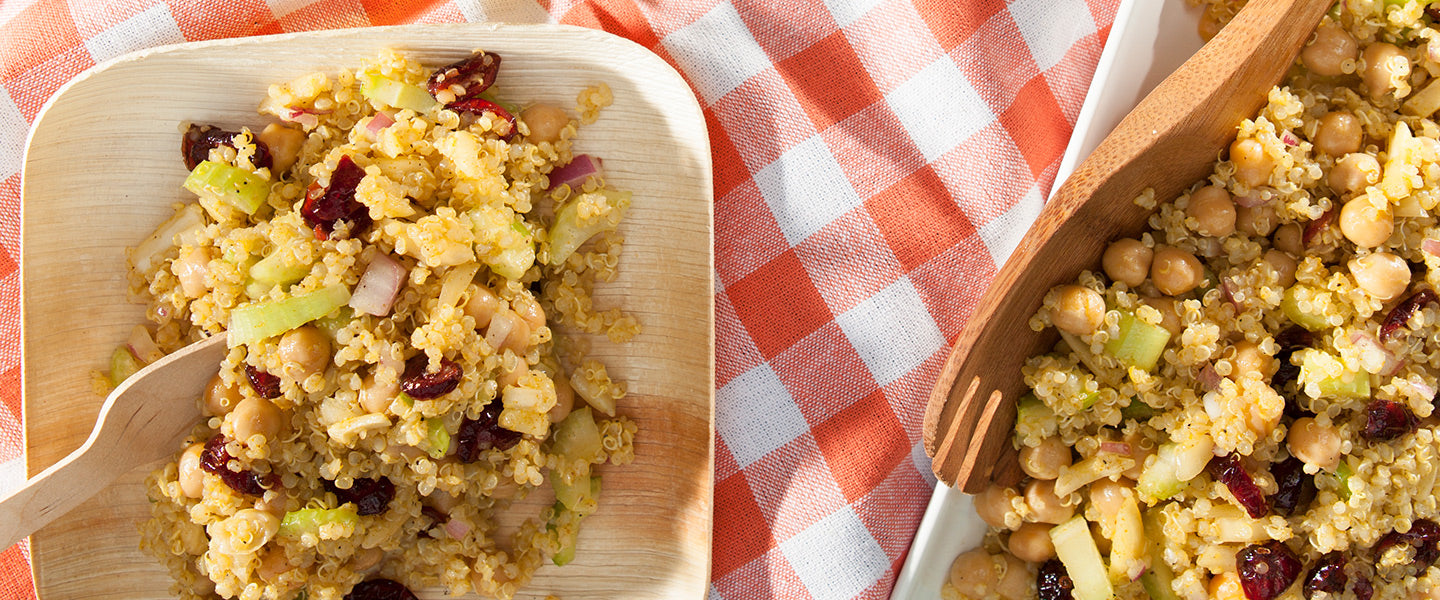 Curried quinoa salad with chickpeas, celery, red onion, and dried cranberries.