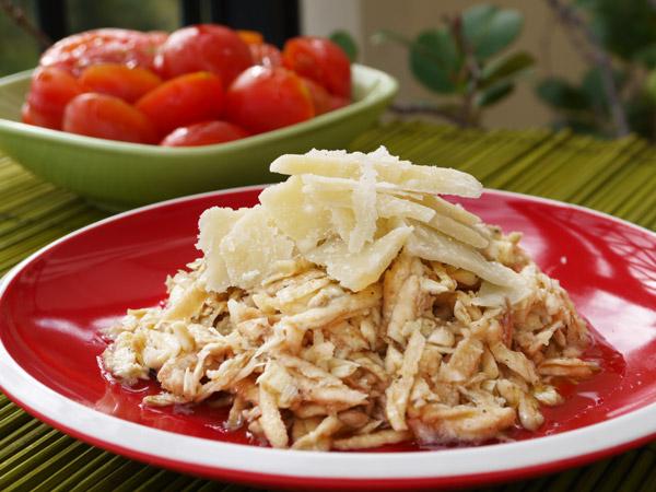 Artichoke salad dressed with olive oil and shaved Parmesan.