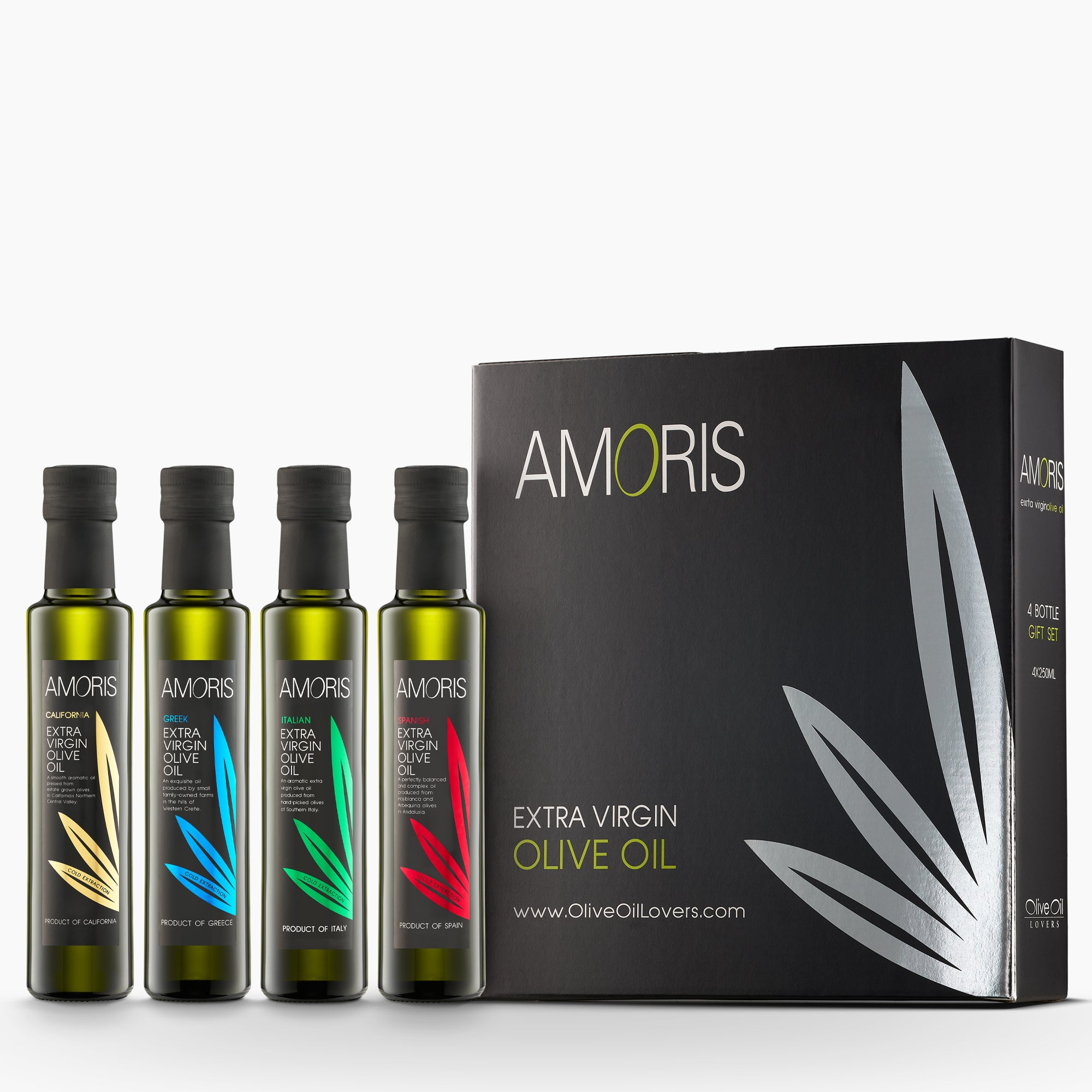 Four 250ml Amoris olive oils from California, Greece, Italy, and Spain beside an elegant gift box.