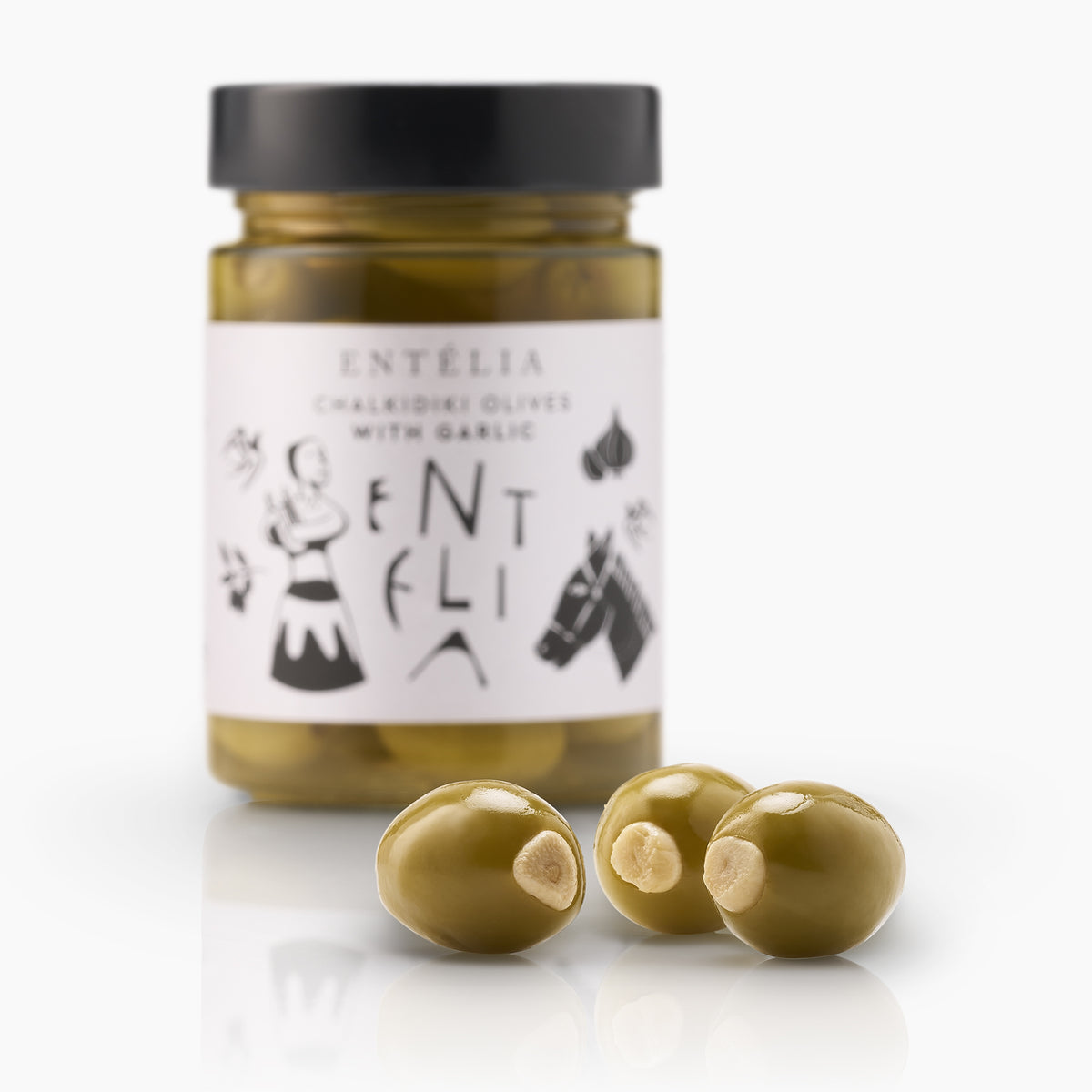 Garlic-stuffed Entelia Chalkidiki olives beside a 360g jar of Entelia olives.