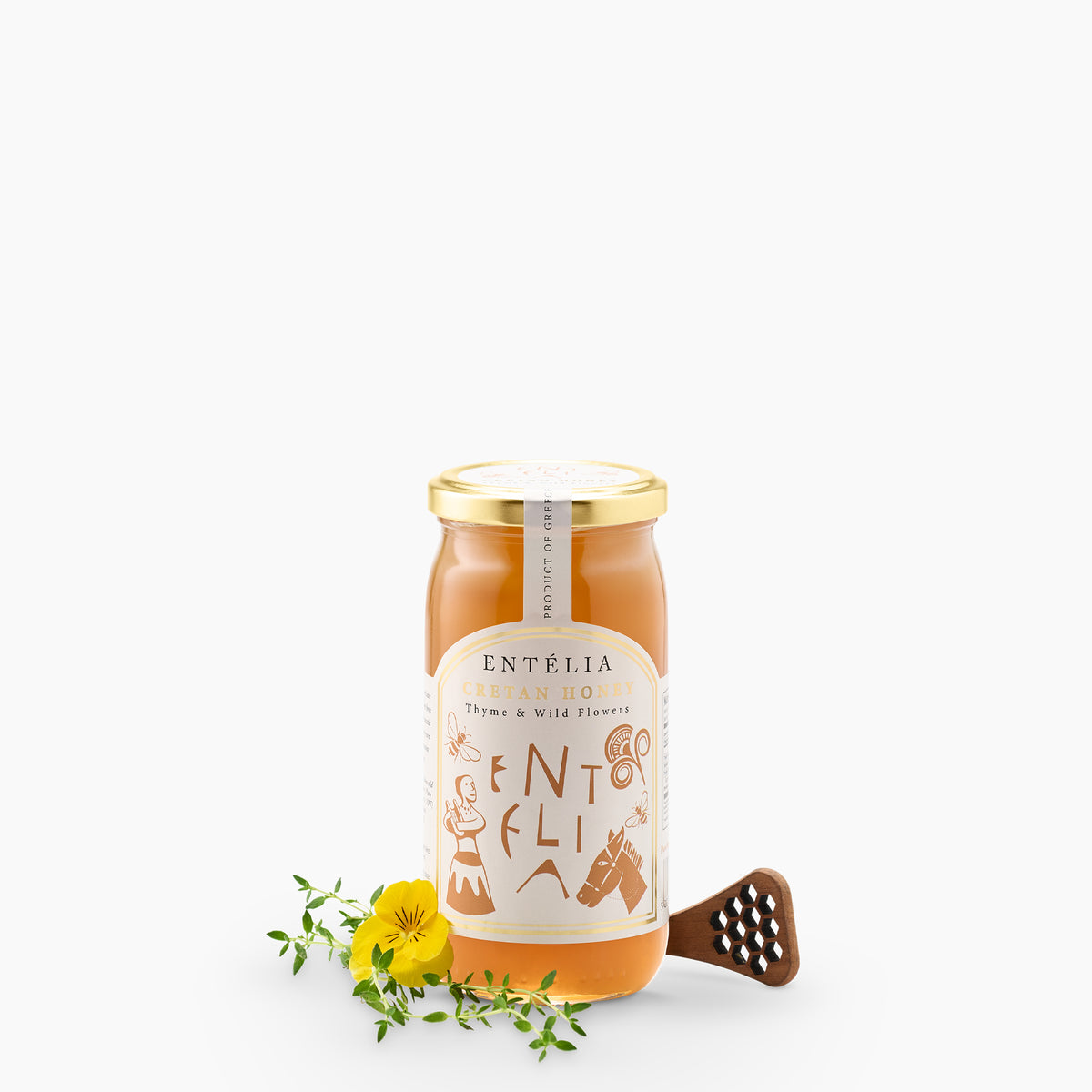 Entelia Thyme & Wild Flowers Cretan Honey 450g jar with yellow flower, thyme, and a honey dipper.