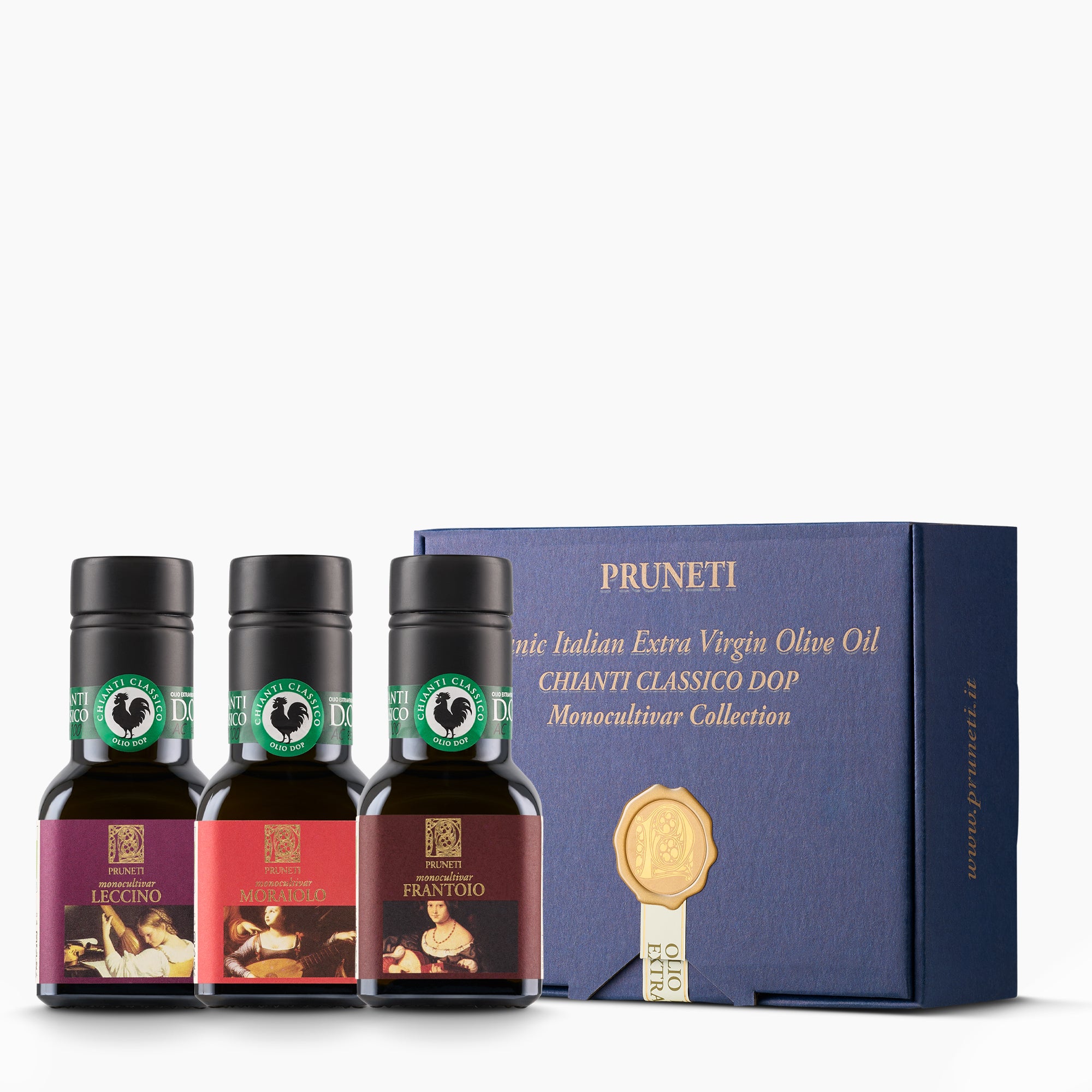 Three 100 ml Pruneti olive oils—Leccino, Moraiolo, and Frantoio—beside an elegant blue gift box.