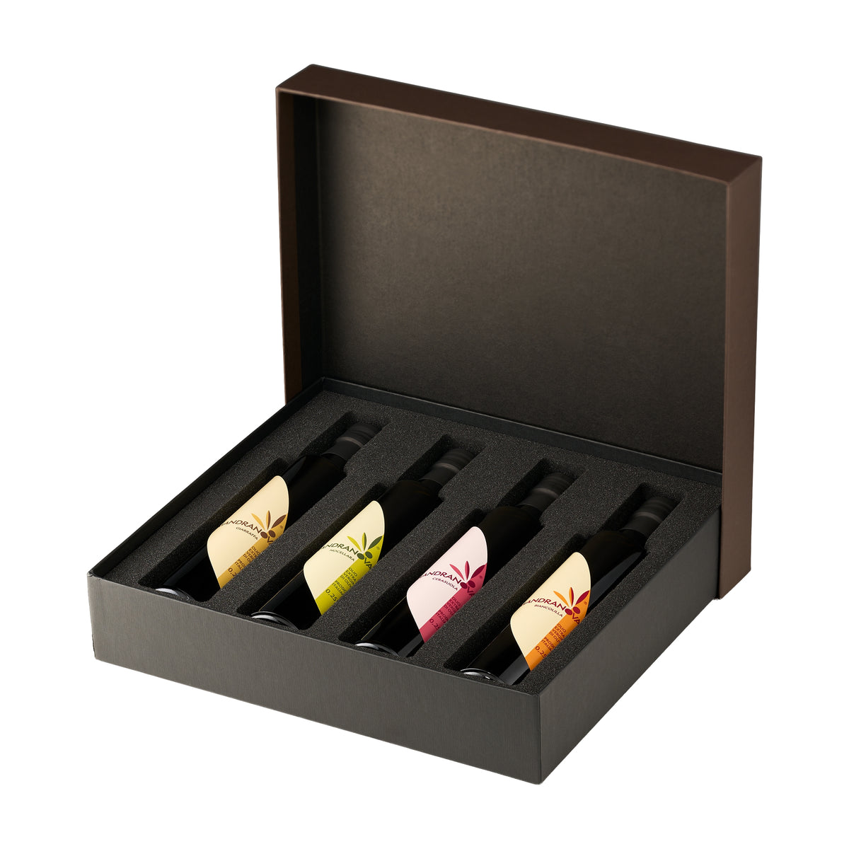 Mandranova Monocultivar Gift Set with four 250 ml olive oil bottles arranged in an open elegant gift box.