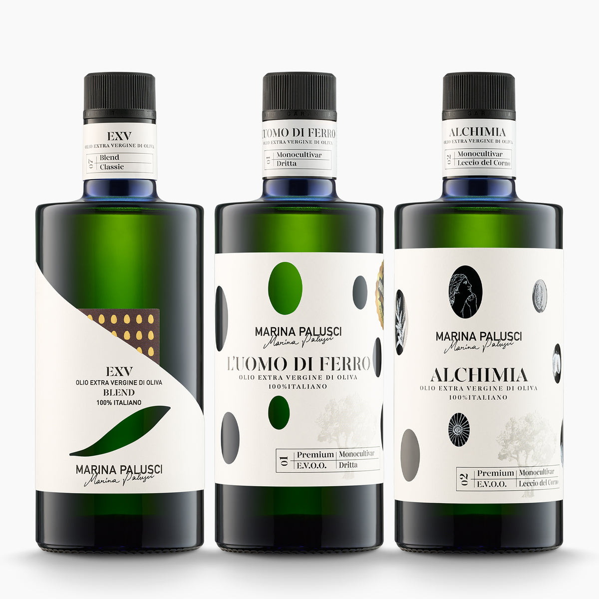Three 500 ml olive oil bottles from Marina Palusci; L'Extravergine, L'Uomo di Ferro, and Alchimia.