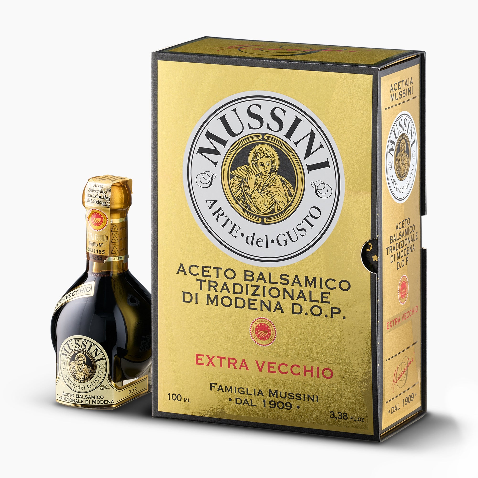 Mussini 25-year Traditional Balsamic Vinegar of Modena DOP, 100 ml bottle beside its elegant yellow gift box.
