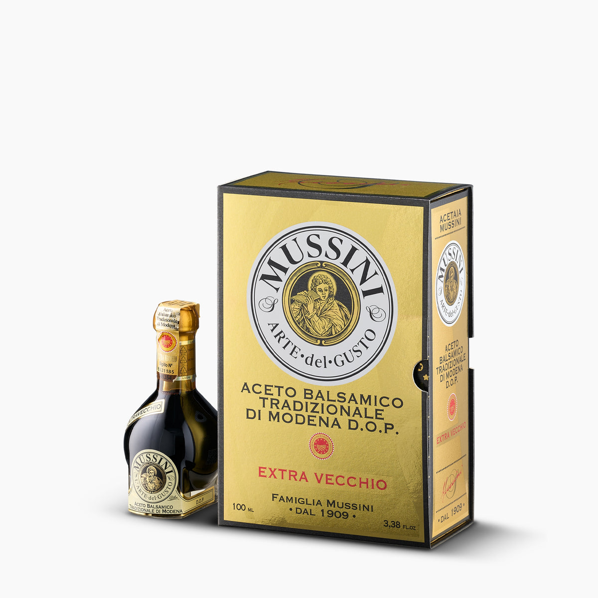 Mussini 25-year Traditional Balsamic Vinegar of Modena DOP, 100 ml bottle beside its elegant yellow gift box.