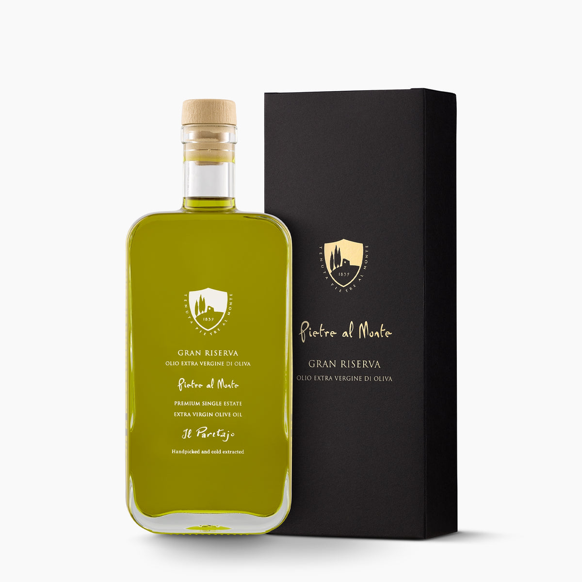 A bottle of Pietre al Monte Gran Riserva extra virgin olive oil, and its gift box.