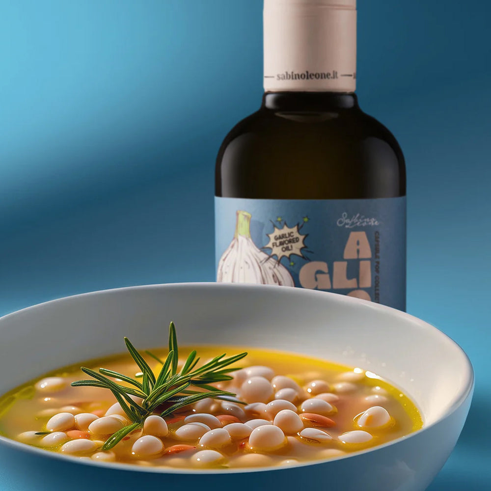 Sabino Leone Garlic 250 ml bottle, and a bowl of white bean soup.