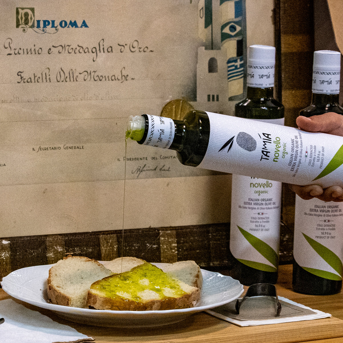 Tamia Organic Novello poured from a 500ml bottle over slices of bread.