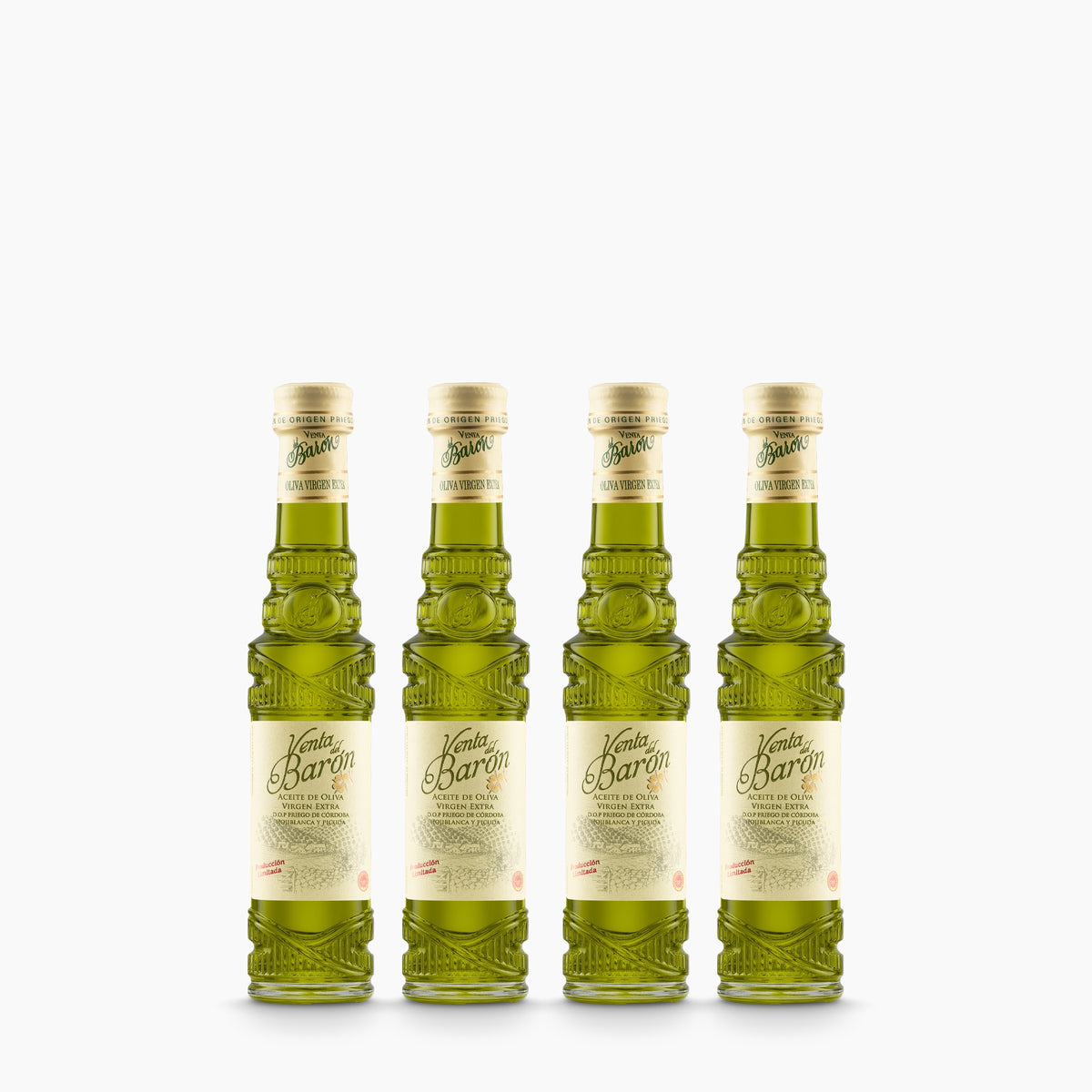 Four 100 ml bottles of Venta del Baron extra virgin olive oil from Andalusia, Spain.