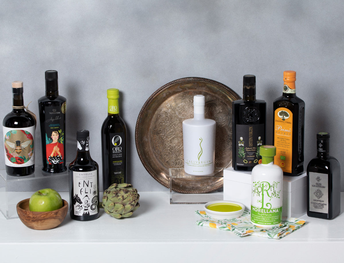 Collection of olive oil bottles and related products