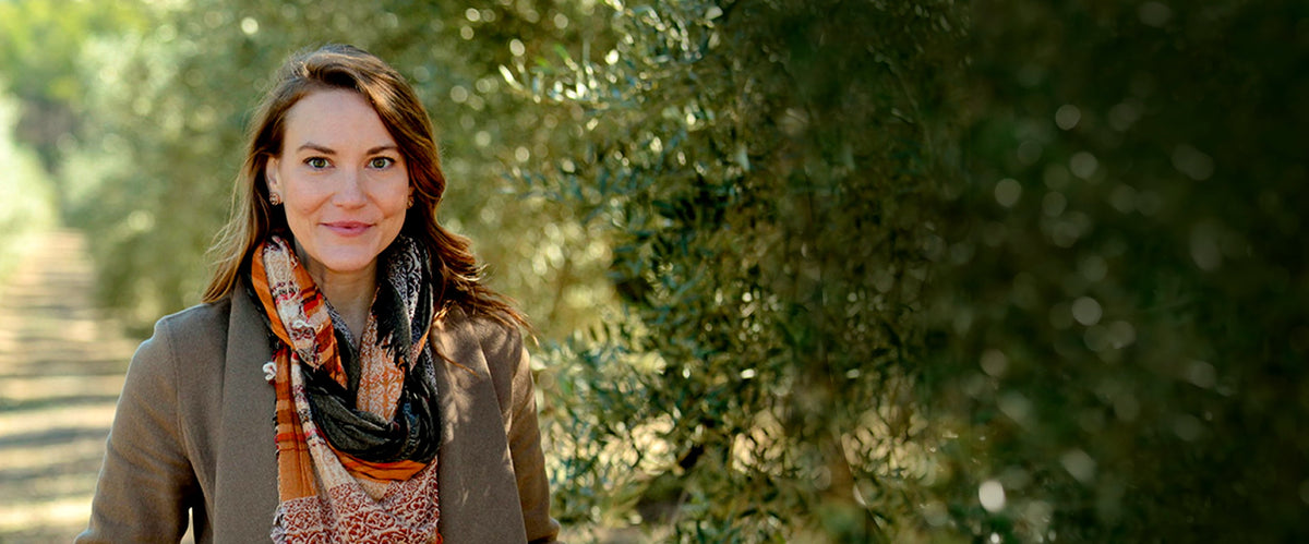 Joanne Lacina at an olive grove in Europe.