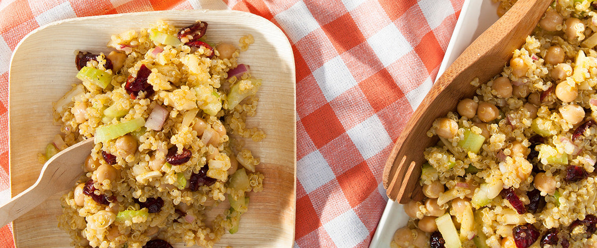 Curried quinoa salad with chickpeas, celery, red onion, and dried cranberries.