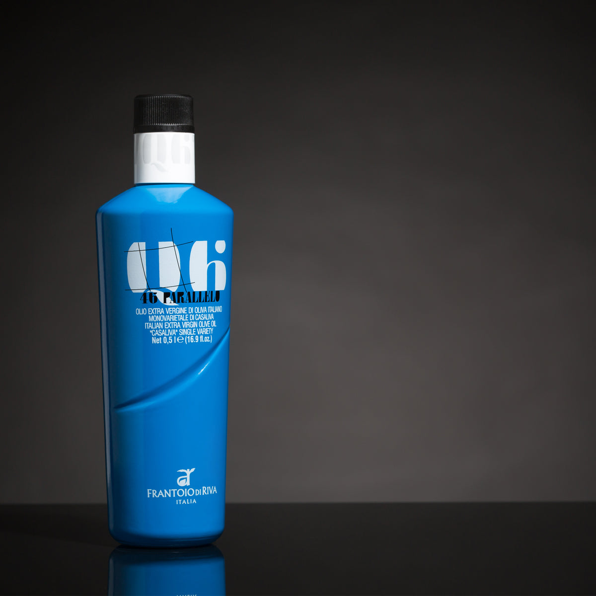 46° Parallelo Casaliva bottle on a reflective surface.