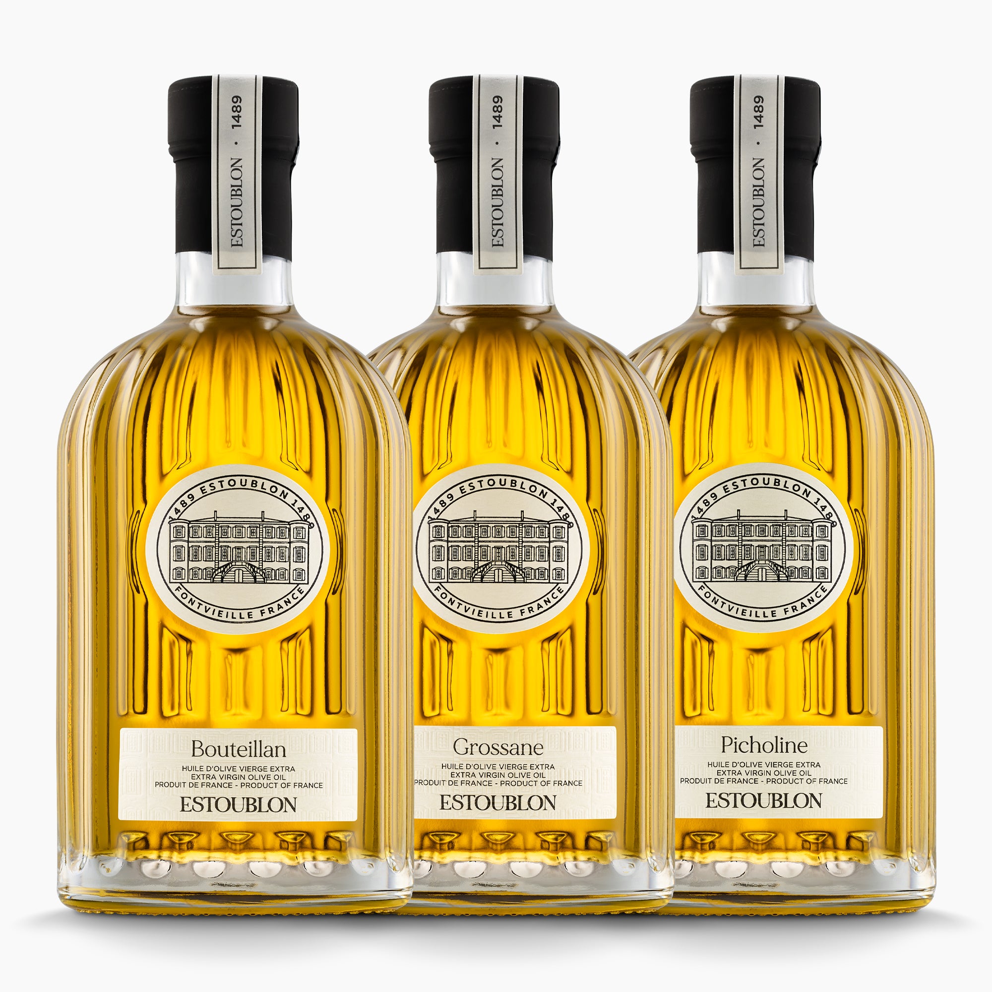 Three 500 ml olive oil bottles from Estoublon; Bouteillan, Grossane, and Picholine.