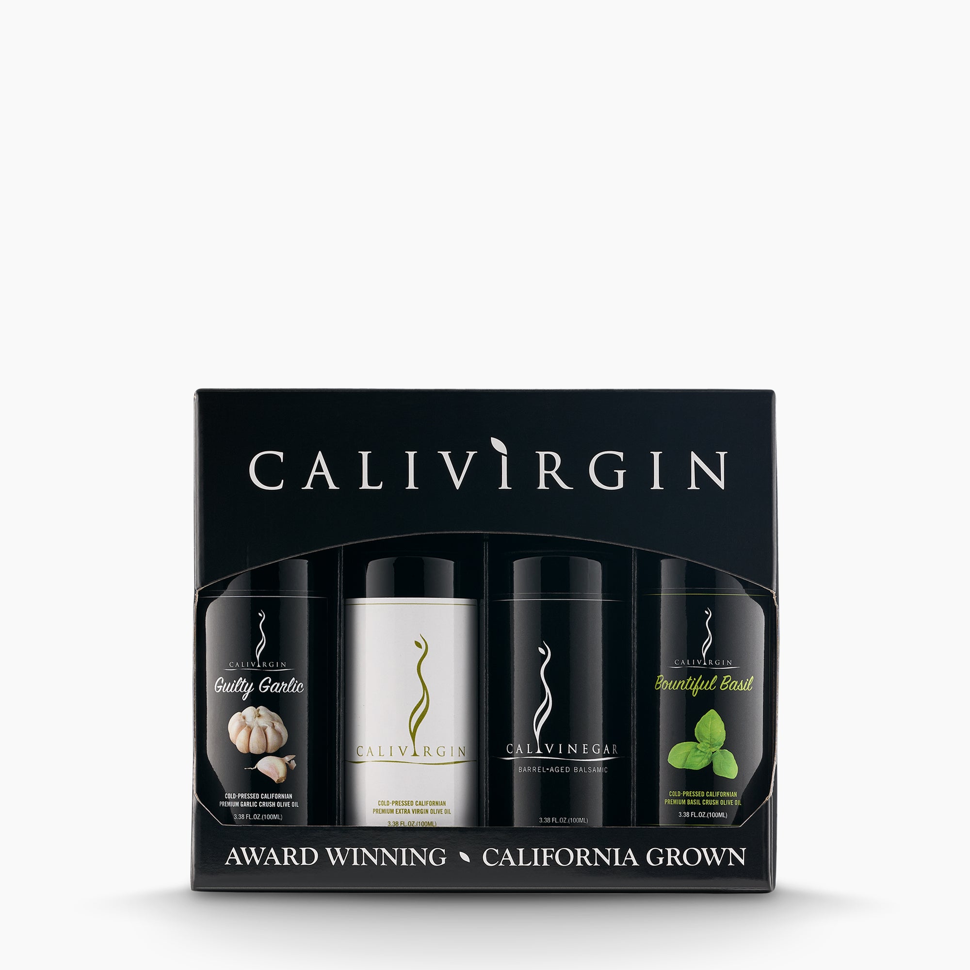 Calivirgin gift box with four 100ml bottles of garlic olive oil, premium olive oil, balsamic vinegar, and basil olive oil.
