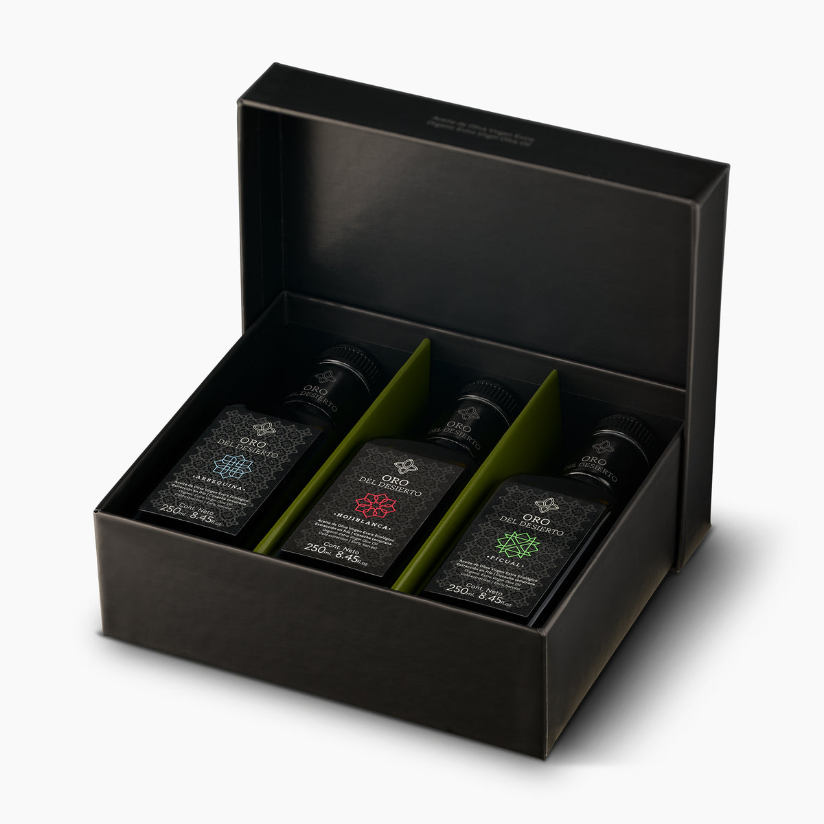 Open Oro del Desierto Organic Monocultivar gift box containing three 250 ml Arbequina, Hojiblanca, and Picual olive oils.