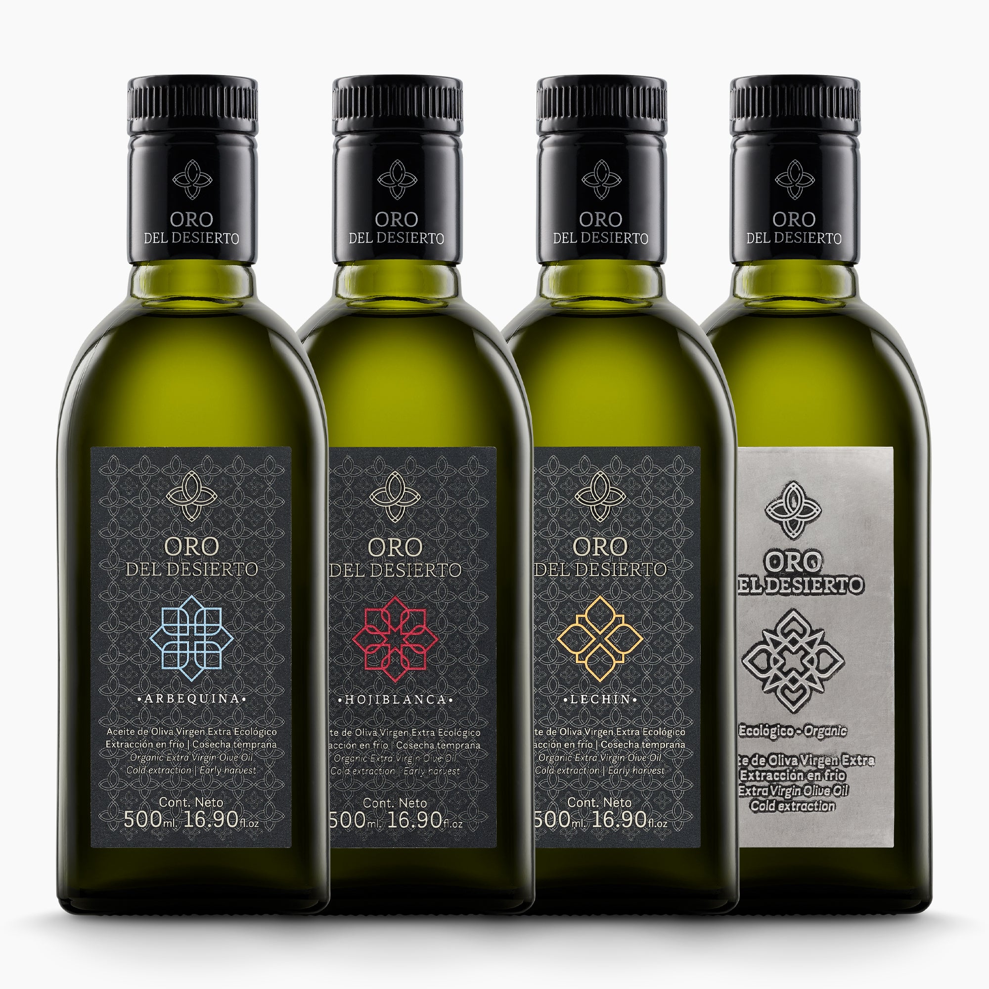 Four 500 ml organic olive oil bottles from Oro del Desierto; Arbequina, Hojiblanca, Lechin, and Coupage.