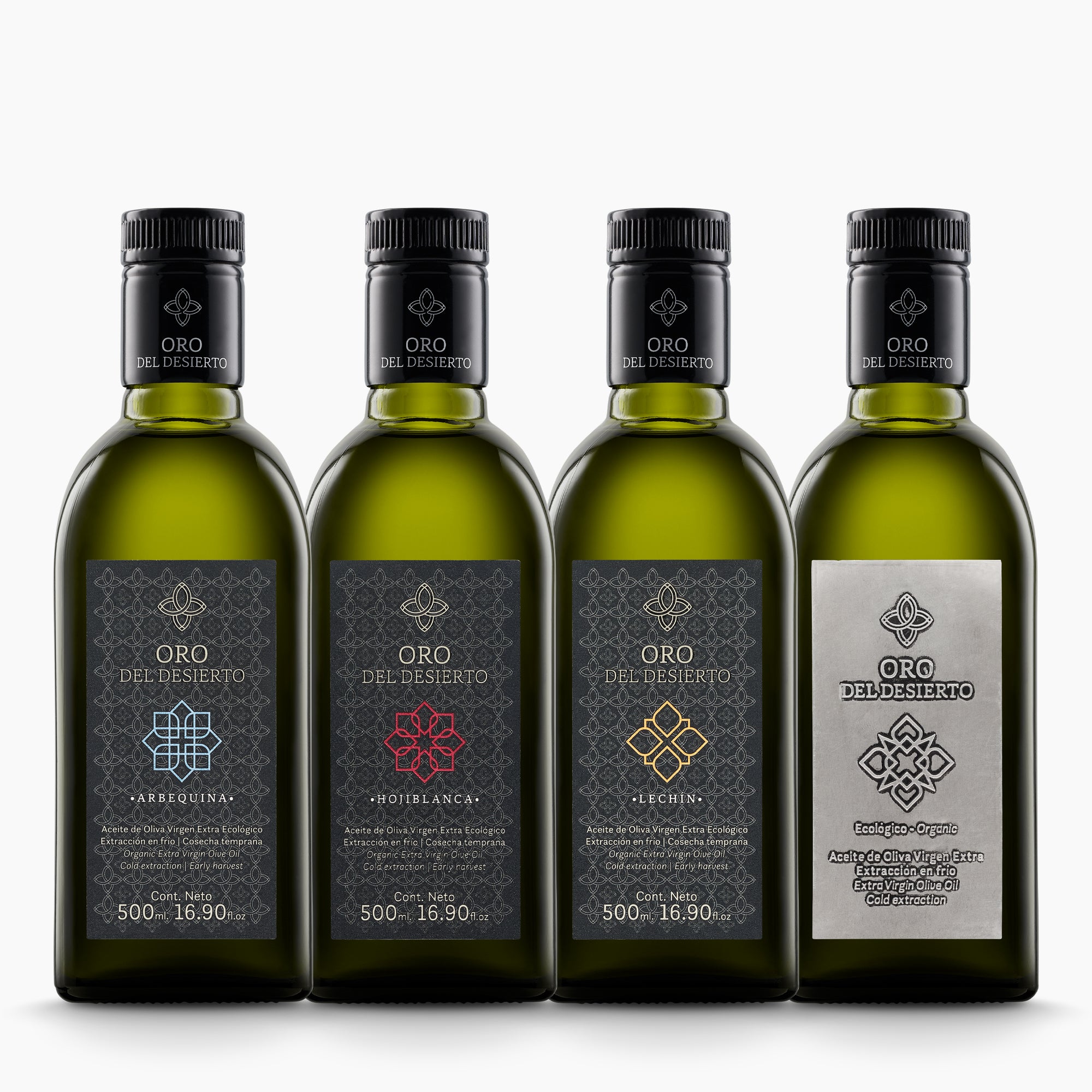 Four 500 ml organic olive oil bottles from Oro del Desierto; Arbequina, Hojiblanca, Lechin, and Coupage.