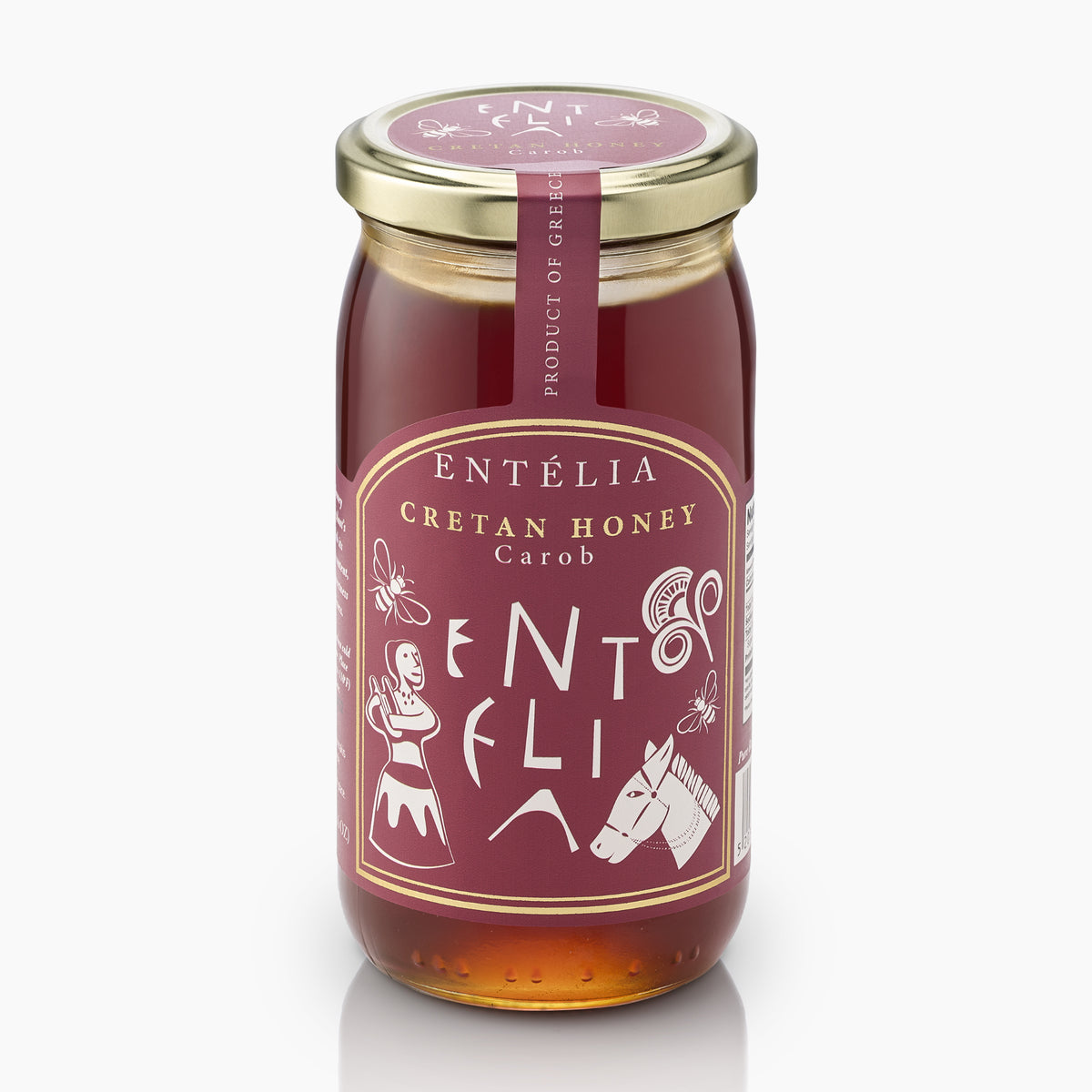 Angled view of 450g jar of Entelia Carob Cretan Honey from Greece.