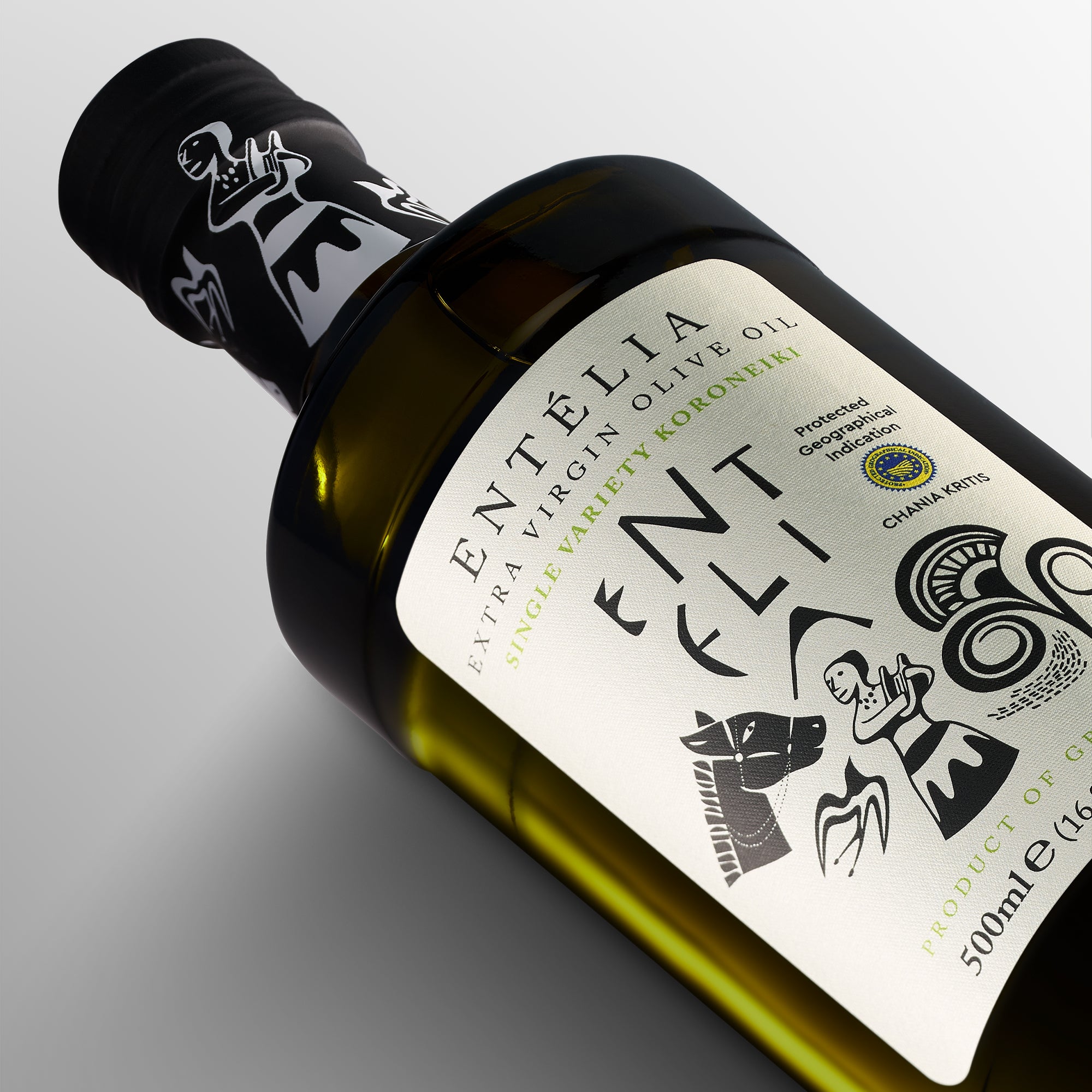 Close-up of 500ml Entelia extra virgin olive oil bottle.