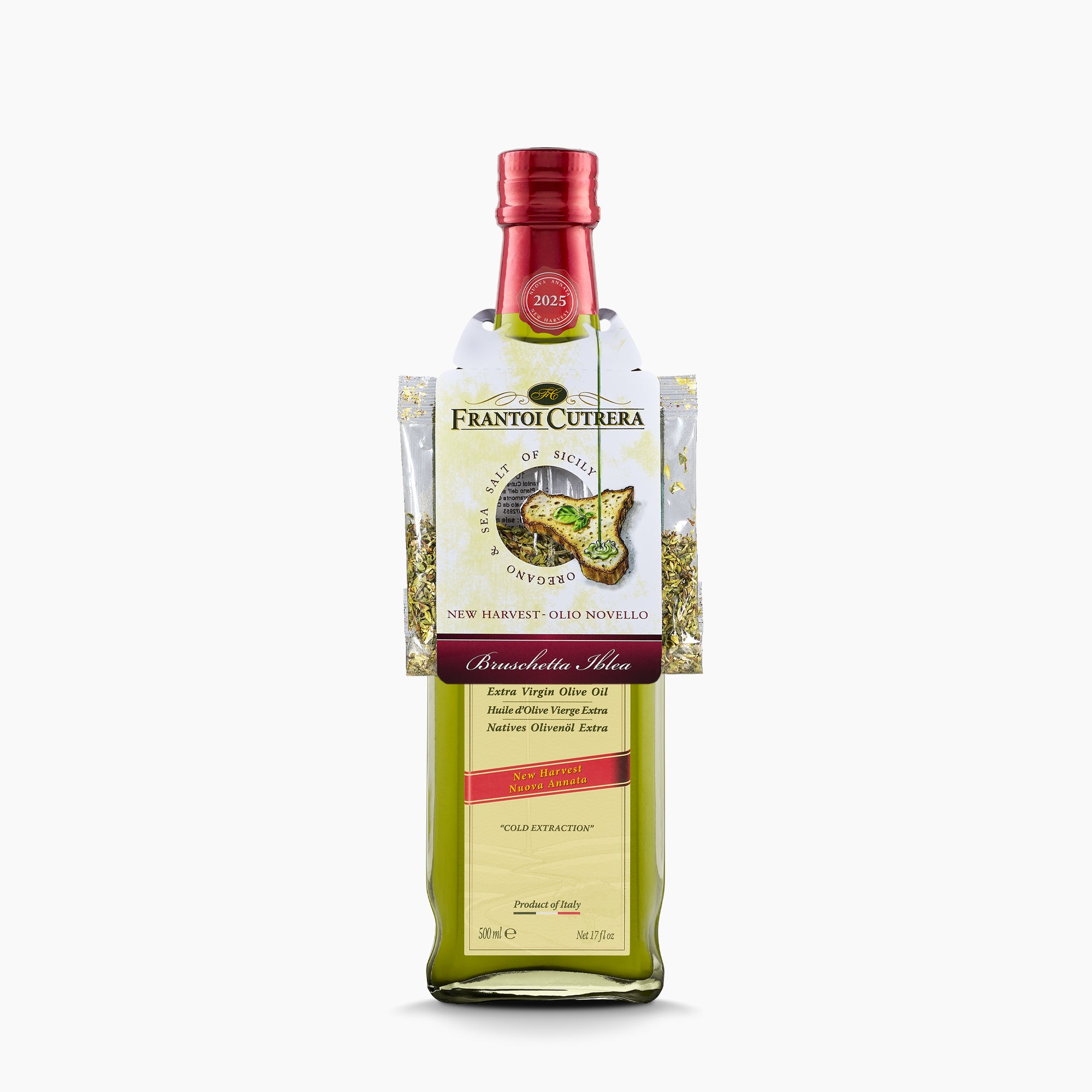 Frantoi Cutrera Frescolio Novello 500ml bottle with Sicilian sea salt and oregano packets.