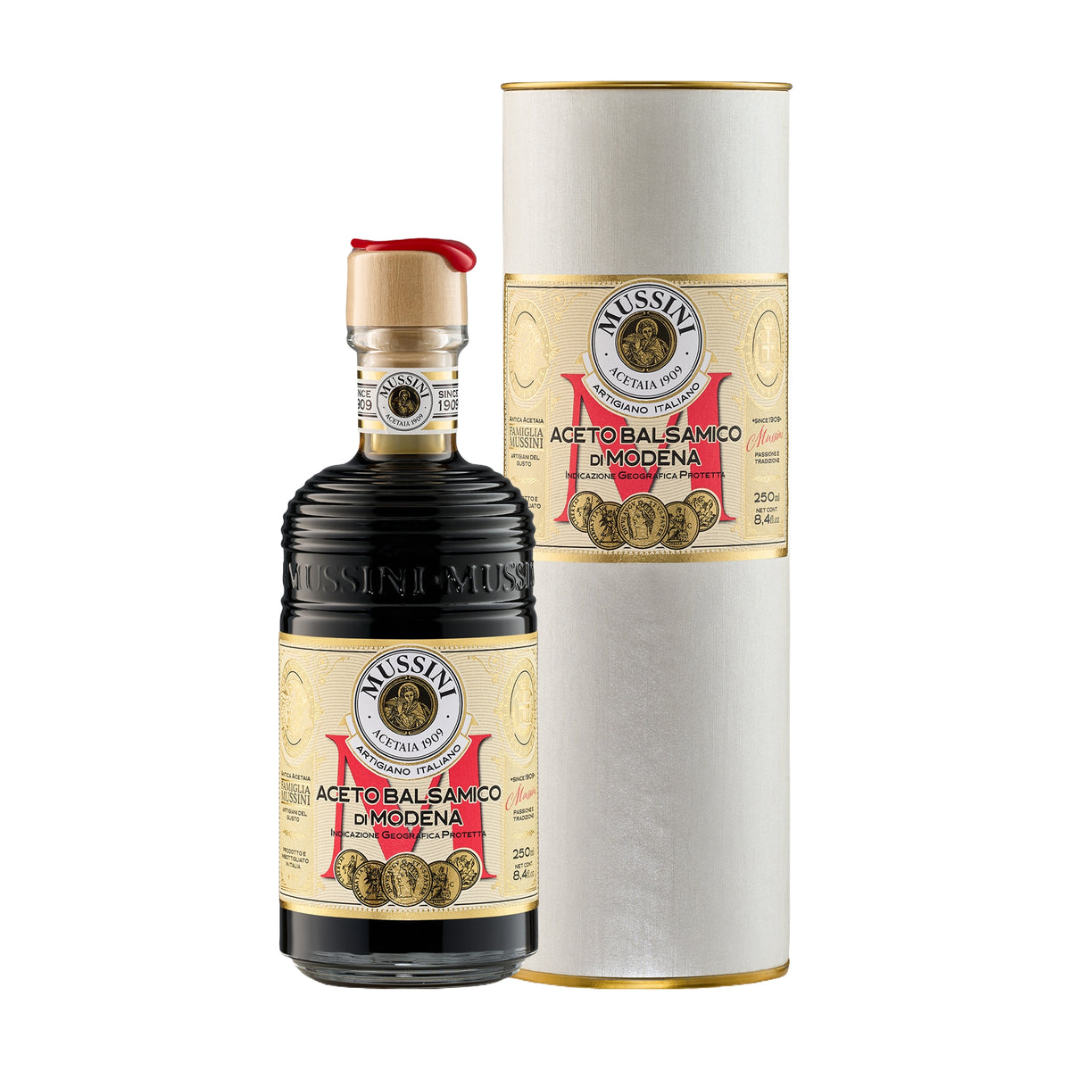 250 ml bottle of Mussini Belle Epoque 5 Medal Balsamic Vinegar of Modena IGP beside its Gift Tube.