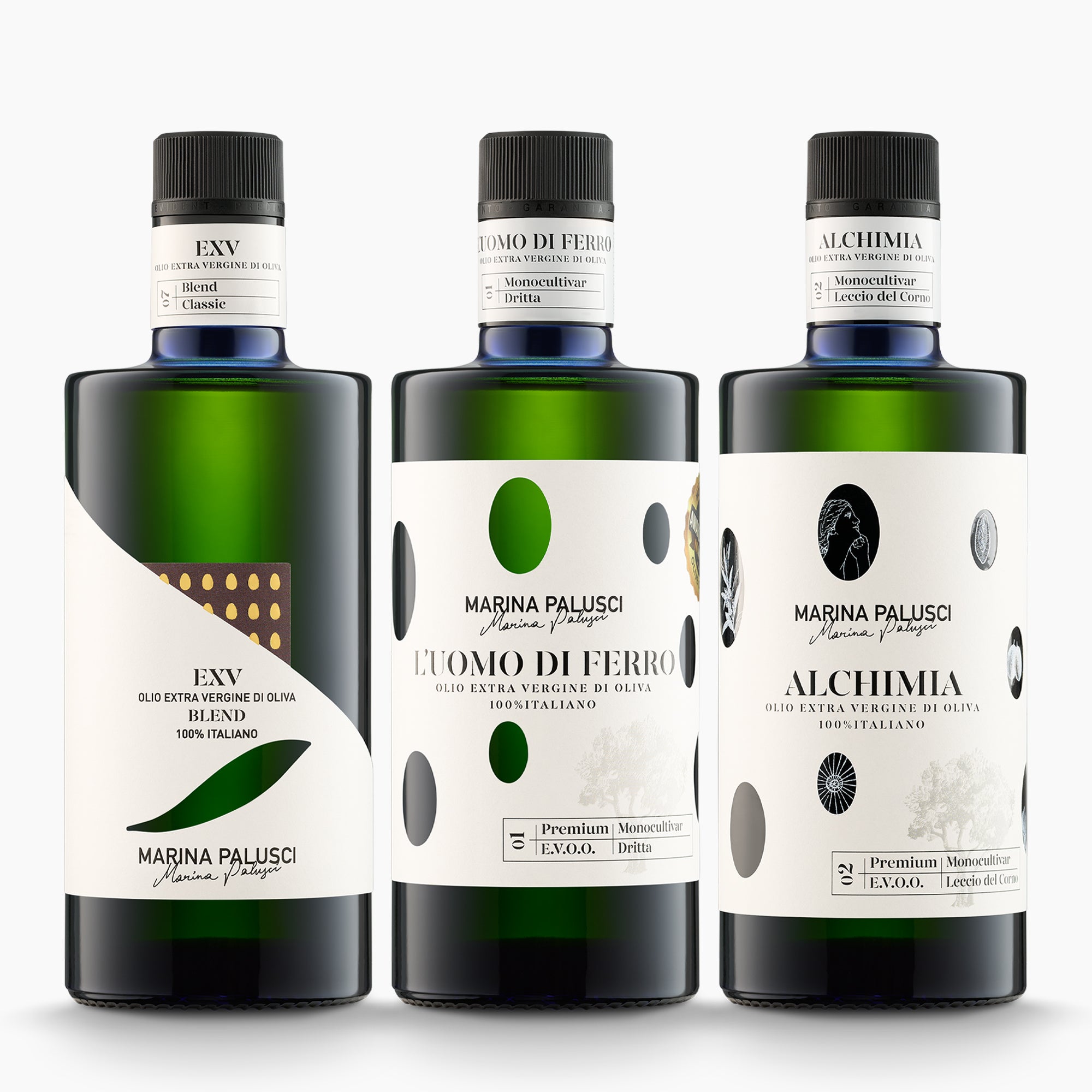 Three 500 ml olive oil bottles from Marina Palusci; L'Extravergine, L'Uomo di Ferro, and Alchimia.