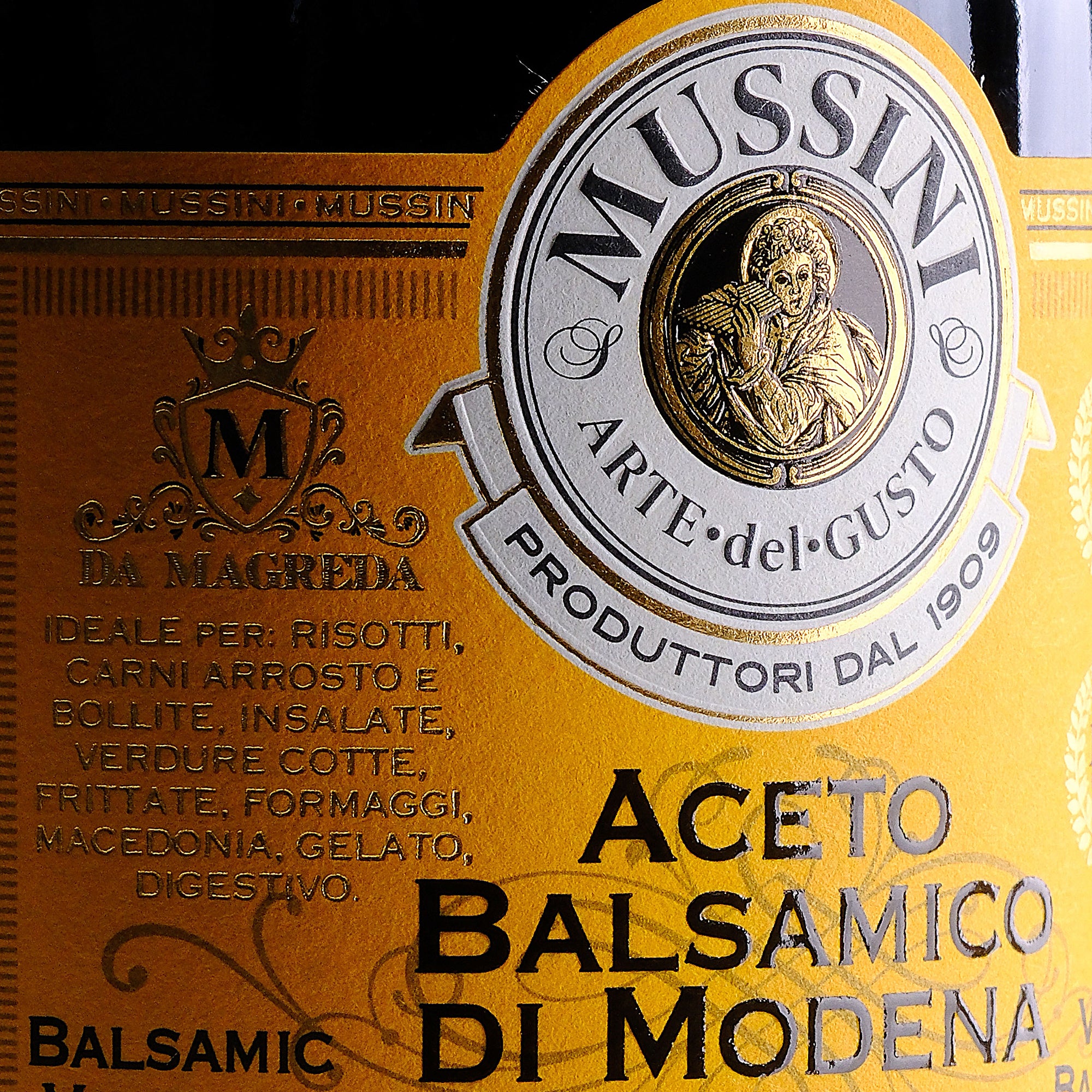 Close-up of the Mussini PGI Balsamic Vinegar of Modena 5 Gold Medals label.