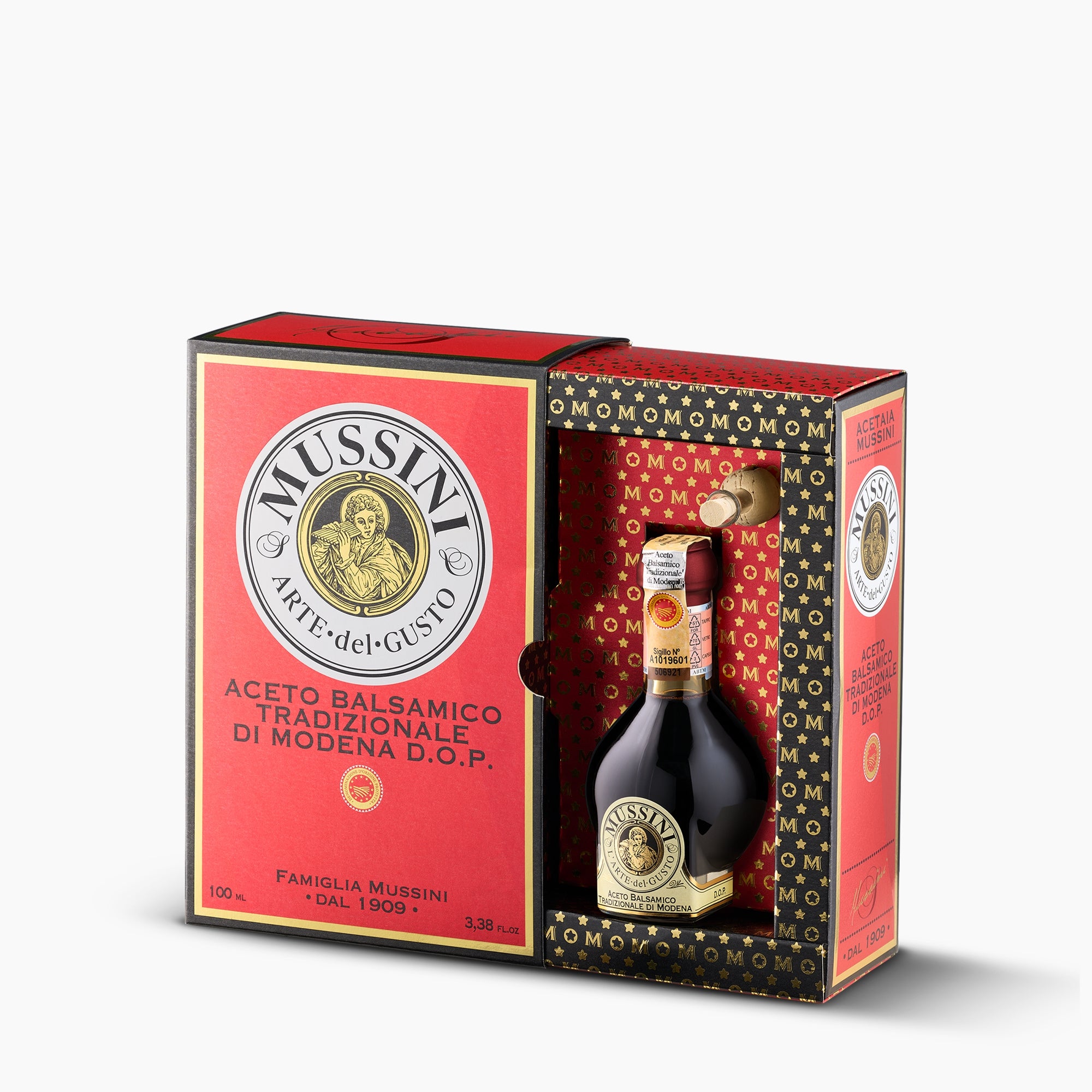 Open Mussini gift box displaying the 100 ml bottle of 12-year Traditional Balsamic Vinegar of Modena DOP.