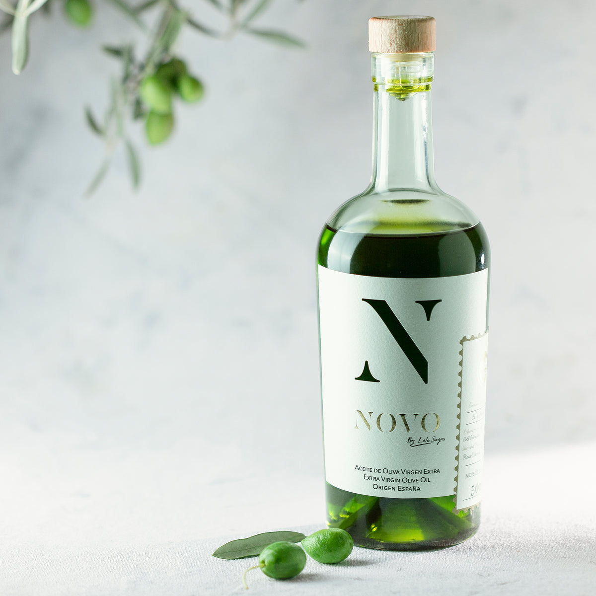Nobleza del Sur Novo by Lola Sagra 500 ml bottle from Andalusia, and green olives.