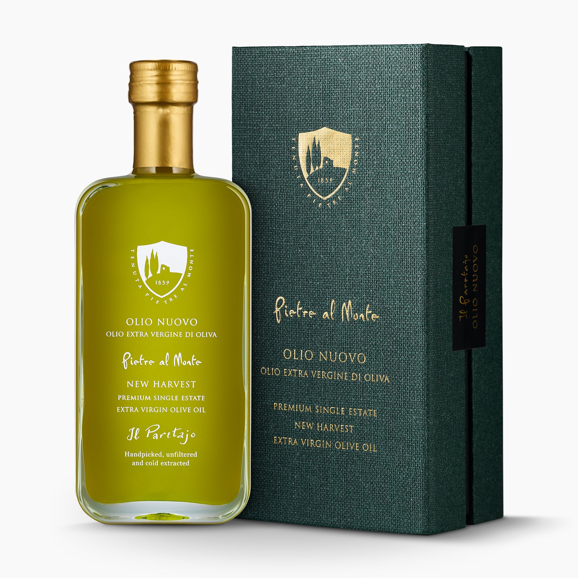 250ml Pietre al Monte Olio Nuovo bottle beside its dark green gift box.