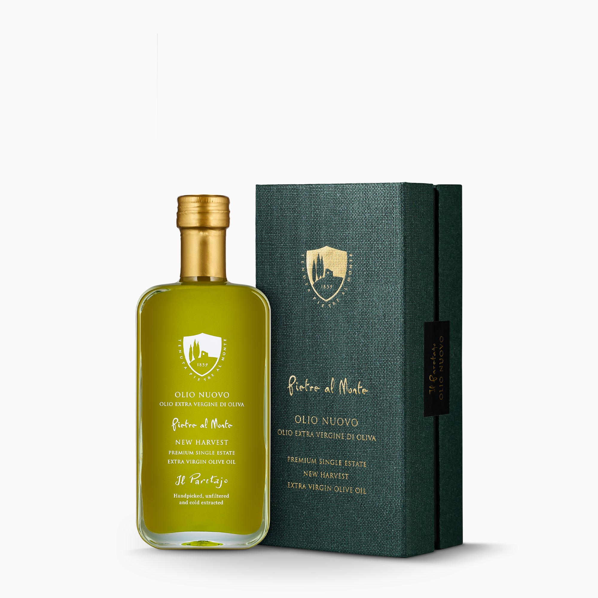 250ml Pietre al Monte Olio Nuovo bottle beside its dark green gift box.