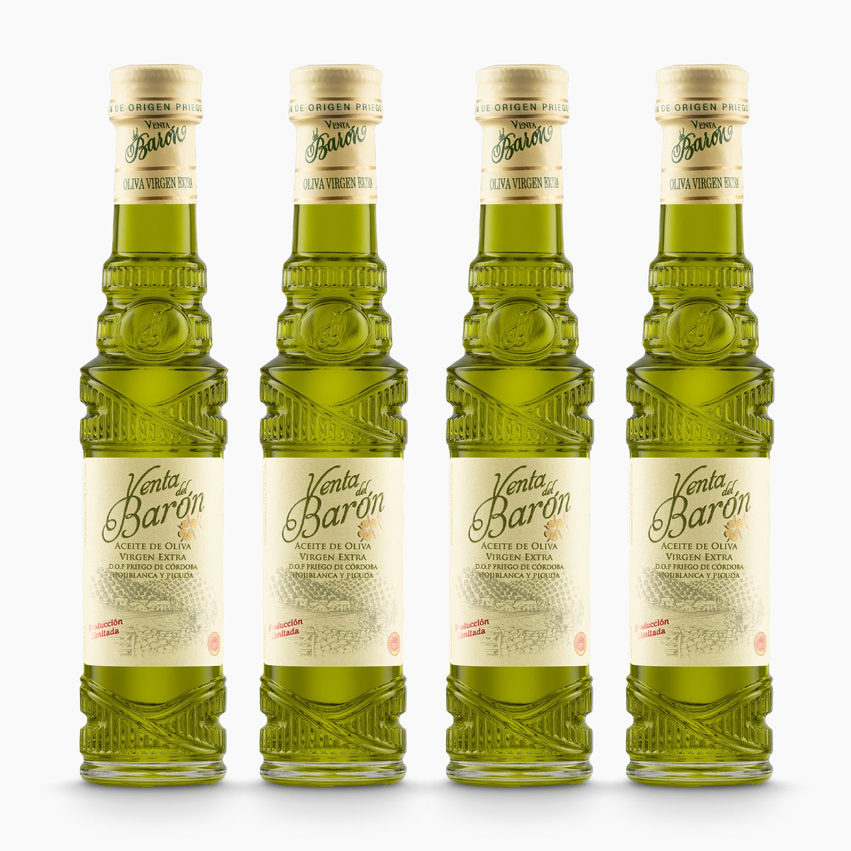 Four 100 ml bottles of Venta del Baron extra virgin olive oil from Andalusia, Spain.
