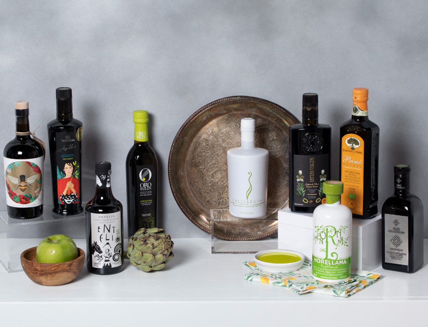 Collection of olive oil bottles and related products